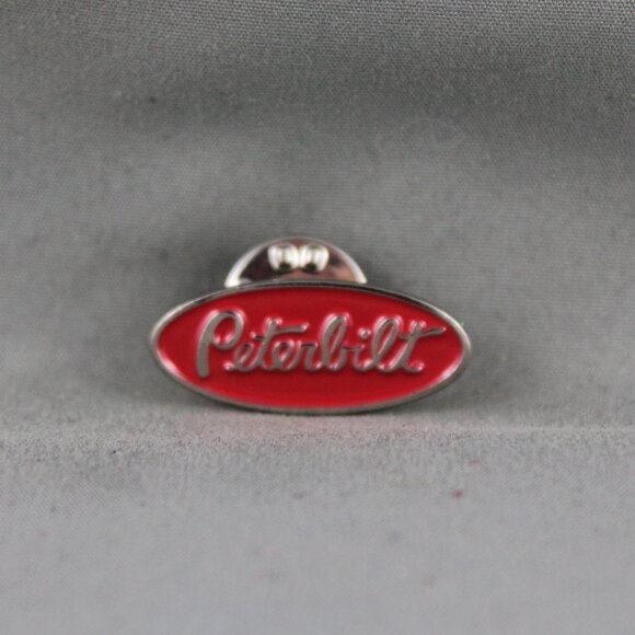 Vintage Advertising Pin - Peterbilt Red Logo - Stamped Pin - Picture 1 of 3